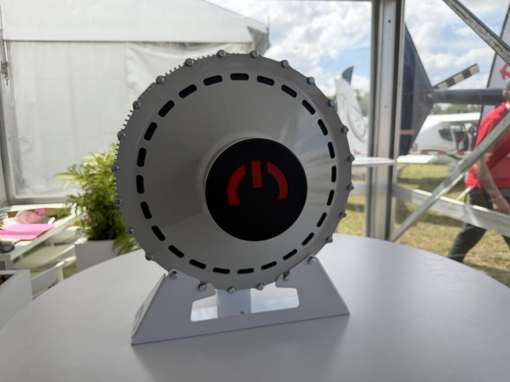 a small electric motor round and polished white