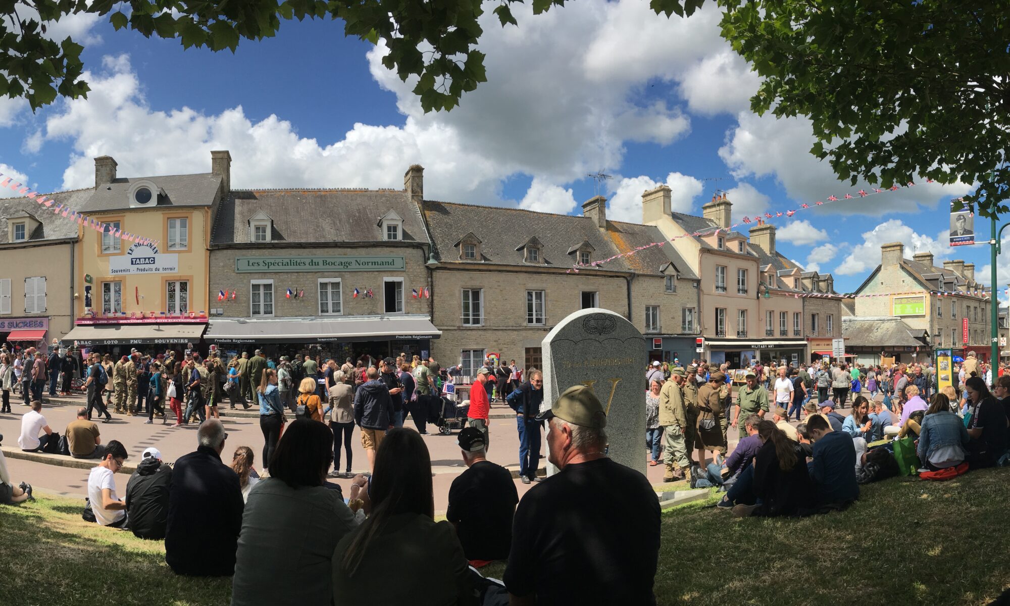 a street scape with people celebrating